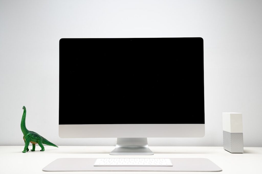 OpenAI Operator agent interface displays automated web browsing and form-filling tasks on a laptop screen.