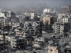 Gaza War kills 75,811: 73,770 Palestinians, 2,039 Israelis dead by May 3, 2026 People gathered near a damaged building in Gaza, surveying the aftermath of an airstrike