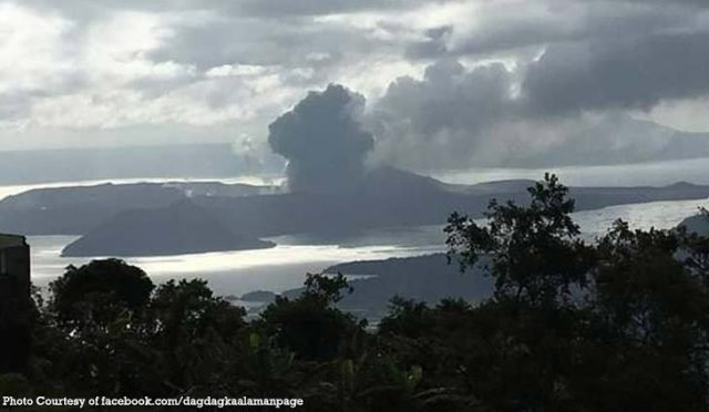 Taal Volcano Tagaytay Businesses Reopen Businesses in Tagaytay City reopen with workers cleaning volcanic ash from storefronts after the Taal Volcano eruption.