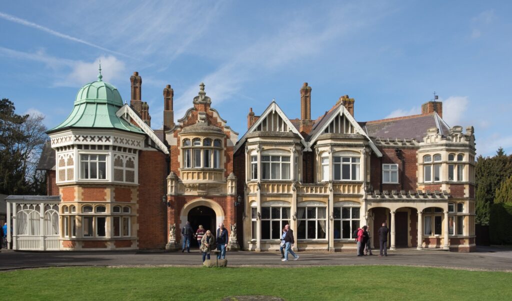 Delegates gather inside historic Bletchley Park mansion for the UK-hosted AI Safety Summit 2023.