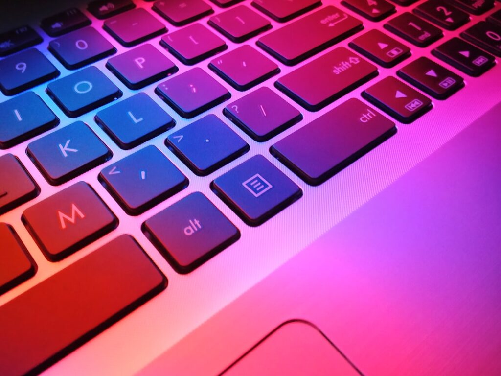 A person typing on a laptop with a ChatGPT interface visible, surrounded by icons representing customer service, content creation, and coding tasks.